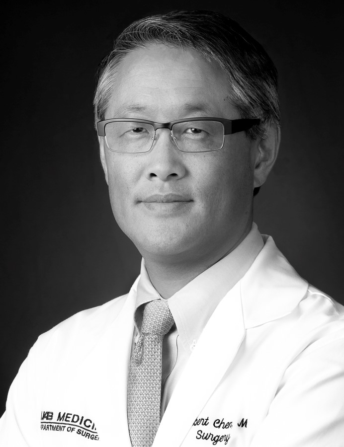 Cropped headshot of Herbert Chen in Black and White