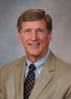 Cropped headshot of Clive S. Grant