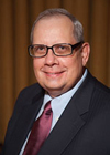 Cropped headshot of John A. Kukora